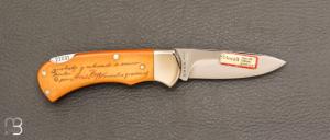   Couteau " Lock back" custom de Puma Scrimshaw "Chien de chasse"