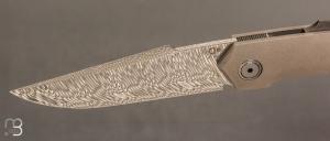  Couteau " Frame-lock " custom par Romain Lopez - Titane et Damasteel