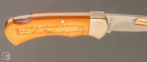   Couteau " Lock back" custom de Puma Scrimshaw "Chien de chasse"