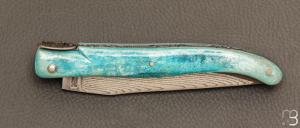   Couteau Laguiole en Aubrac 12 cm manche en os de carbou bleu