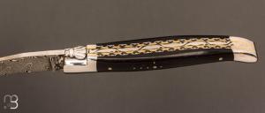  Couteau Laguiole en Aubrac 12 cm double platines laiton manche ébène et lame damas