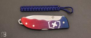 Couteau  " Evoke Alox Blue/Red " Suisse Victorinox - 0.9415.D221