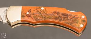   Couteau " Lock back" custom de Puma Scrimshaw "Chien de chasse"