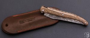   Couteau " Laguiole 12cm " custom par Rozelier Fabien- Ty Coutelier - Os de dinosaure et damas plume