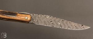  Couteau Laguiole en Aubrac modèle Origine Tour Eiffel N°190 - Croûte d'ivoire de mammouth et Damas Balbach
