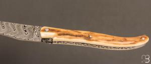    Couteau Laguiole en Aubrac 12 cm manche en ivoire de mammouth et lame en damas de Markus Balbach