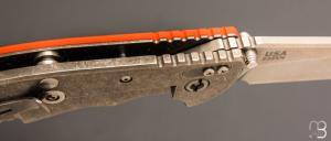   Couteau " XM-24 " par Rick Hinderer - G10 orange et lame en S35VN